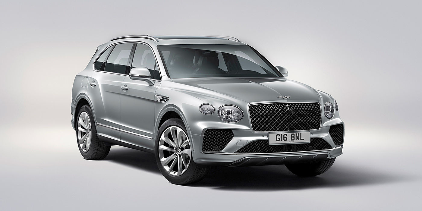 Bentley Beirut Bentley Bentayga in Moonbeam paint, front three-quarter view, featuring a matrix grille and elliptical LED headlights.