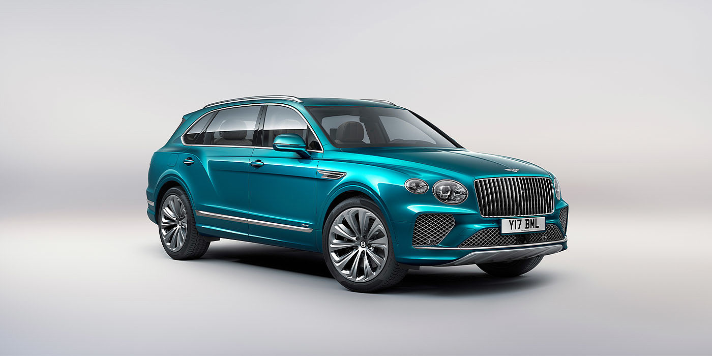 Bentley Beirut Bentley Bentayga EWB Azure front three-quarter view, featuring a fluted chrome grille with a matrix lower grille and chrome accents in Topaz blue paint.