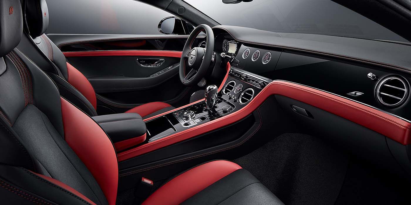 Bentley Beirut Bentley Continental GT S coupe front interior in Beluga black and Hotspur red hide with high gloss Carbon Fibre veneer
