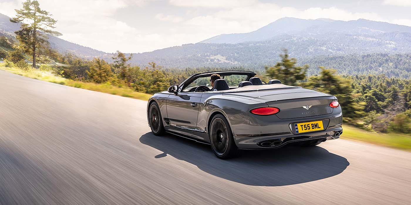 Bentley Beirut Bentley Continental GTC S convertible in Cambrian Grey paint rear 34 dynamic driving