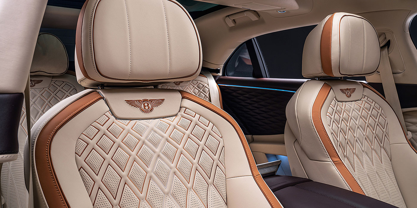 Bentley Beirut Bentley Flying Spur Odyssean sedan rear seat detail with Diamond quilting and Linen and Burnt Oak hides