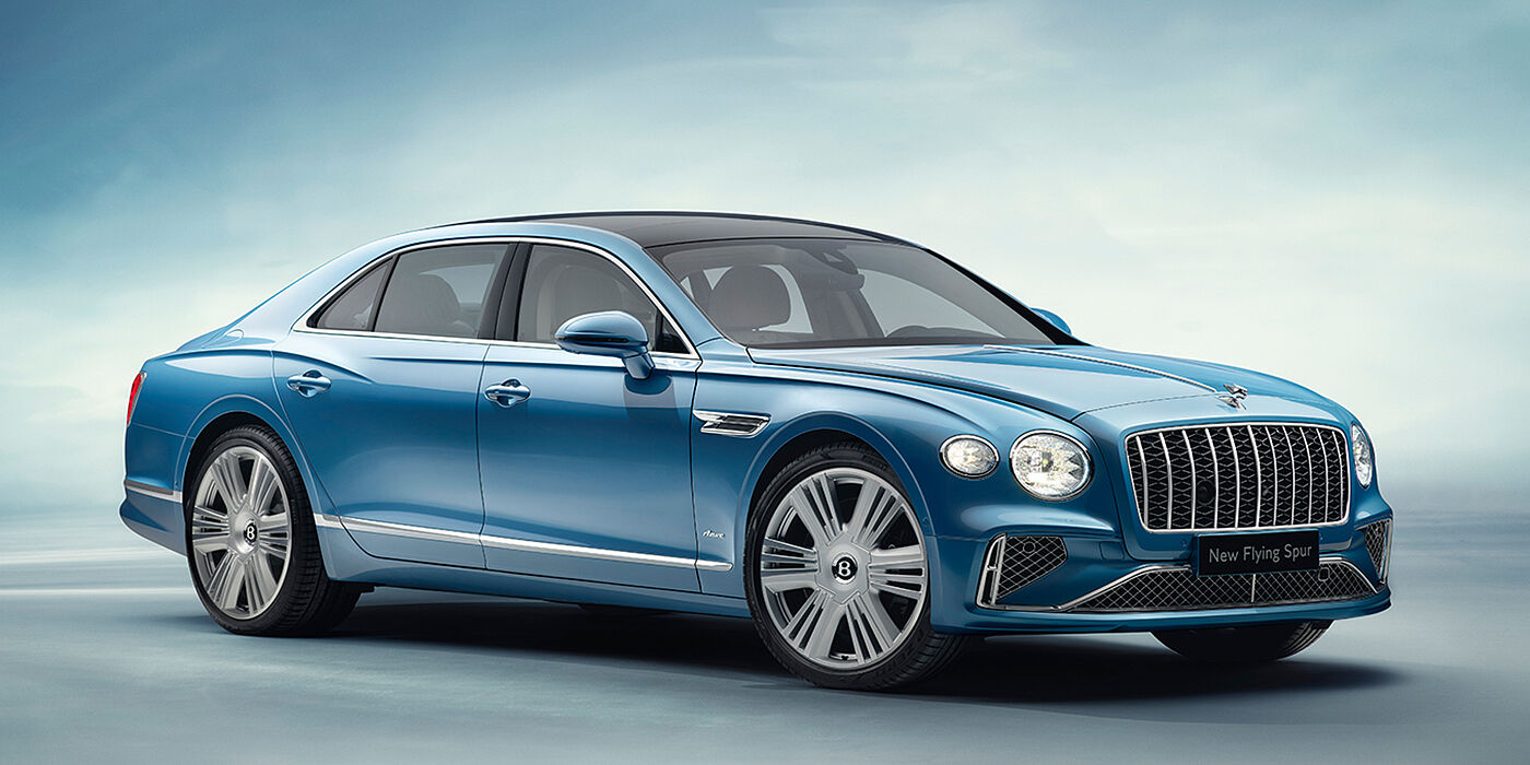 Bentley Beirut New Bentley Flying Spur Azure sedan front view in Light windsor blue by Mulliner paint with 22 inch Azure wheels and chrome exterior details