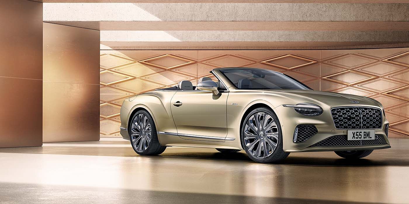 Bentley Beirut Bentley New Continental GTC Mulliner V8 hybrid front three quarters in Patina paint