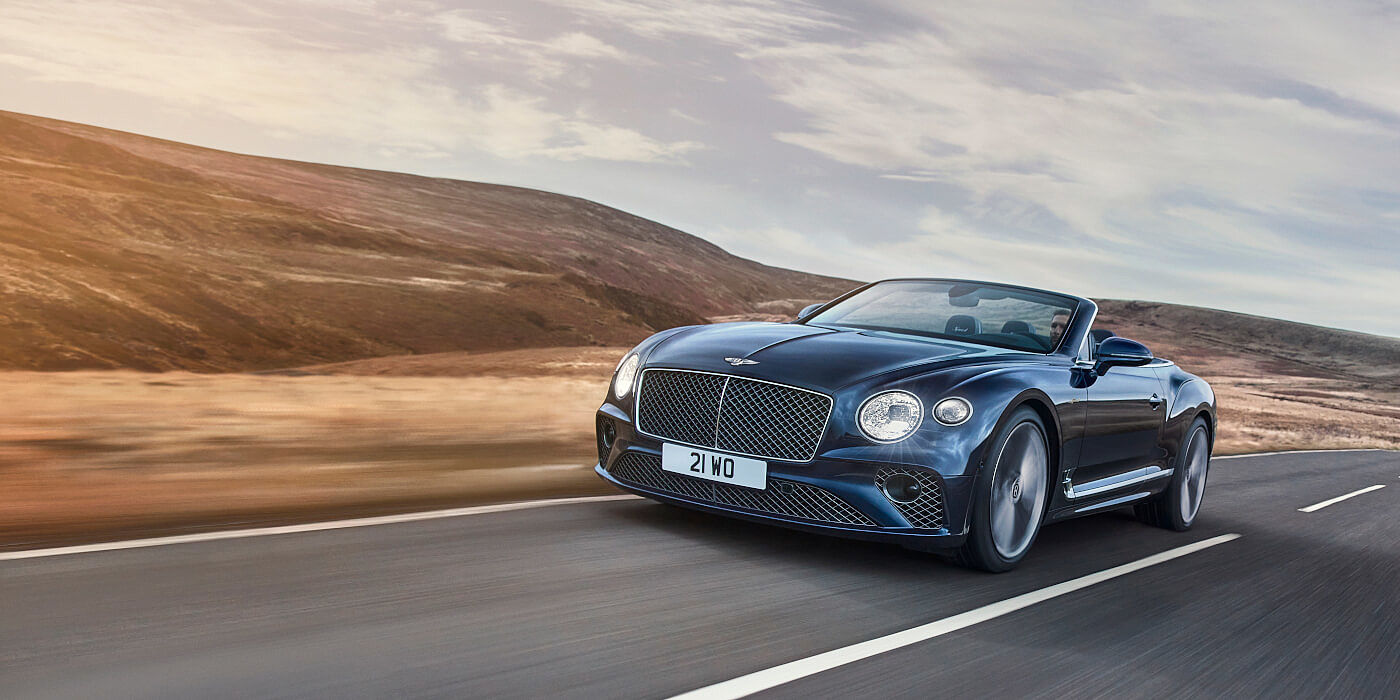 Bentley Beirut Bentley Continental GTC Speed convertible in Peacock paint side front 34 dynamic