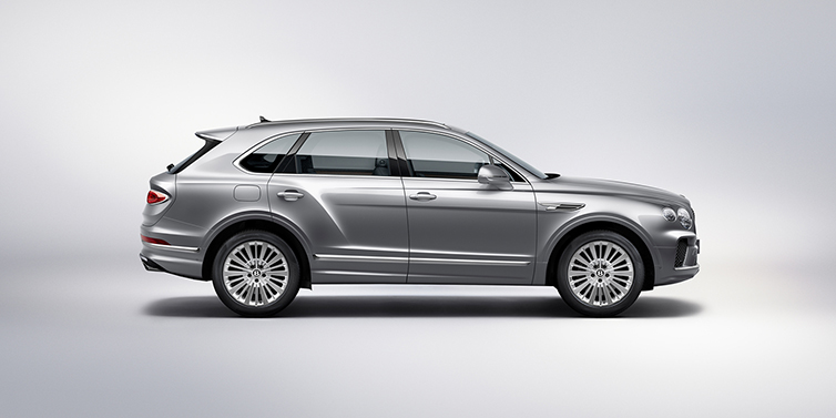 Bentley Beirut Bentley Bentayga SUV side profile in Moonbeam silver paint against white background featuring 21 inch 5 spoke wheels
