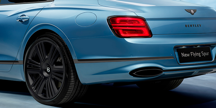 Bentley Beirut New Bentley Flying Spur Azure sedan in Light windsor blue by Mulliner paint and Black Specification, showing 22 inch Black Azure wheel, black exhaust pipes and exterior features