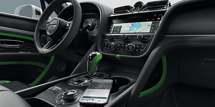 Bentley Beirut Bentley Bentayga Speed SUV front cabin in Hyper Green and Beluga black hides, with Black Stained Crown Cut Walnut veneer