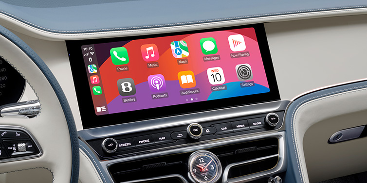 Bentley Beirut New Bentley Flying Spur Azure sedan front cabin central MMI screen showing available services against Linen and Brunel hides and Piano Linen veneer
