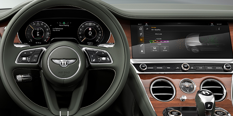 Bentley Beirut New Bentley Continental GTC convertible front interior steering wheel view, with Beluga black leather and Crown Cut walnut veneer
